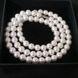 Frozen fantastics faux pearls 8mm 22 inches long.